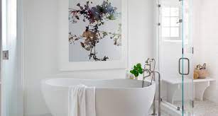 Displaying artworks in soft hues that blend well with the color theme of your bathroom is a great idea. Bathroom Art Ideas How To Choose Art For Your Master Bath
