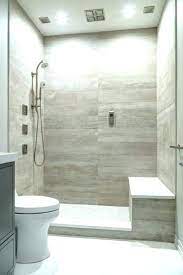 Notice how the white subway tile used in the shower and the light trim and vanity pull the design together. Modern Bathroom Tiles Design Philippines