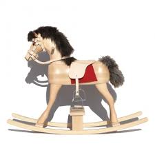 A wooden toy horse that children can move backwards and forwards while they are sitting on it 2…. Conny Rocking Horse With Bridle And Saddle Desaive Design