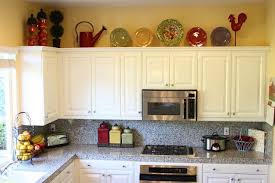 For example, you can create a beachy theme above the cabinet in a summer. Top Of Cupboard Decor Pin For Pinterest Comfy Home Above Kitchen Cabinets Kitchen Cabinets On A Budget Decorating Above Kitchen Cabinets