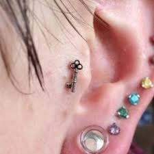 They were now seated and she was perusing the menu. 7 Ear Perusing Ideas Ear Piercings Piercing Tattoo Ear