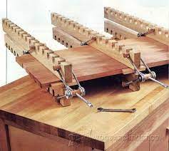 When you turn these flat sawn pieces up on end, you get quarter sawn material in the direction of clamping force! Diy Panel Clamps Panel Glue Up Tips Jigs And Techniques Woodwork Woodworking Woodworking Plan Carpentry Projects Woodworking Techniques Woodworking Wood