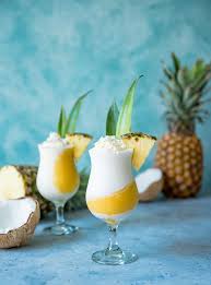 Golden Layered Pina Coladas National Pina Colada Day Recipe Pina Colada Coconut Rum Frozen Pina Colada