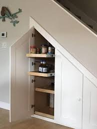 Here are a few ideas on stair materials Below Stairs Storage Cabinet Etsy Stair Storage Staircase Storage Basement Remodeling