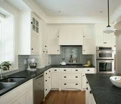 Backsplash For Black Countertops And White Cabinets White Cabinets Gray Subway Tile Backsplash Dark Counters Home Kitchens Kitchen Renovation Kitchen Remodel