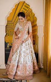 An Understated Beach Wedding With Sunset Pheras And A Bride Who Designed Her Own Lehenga Indian Bridal Outfits Indian Bridal Dress Indian Bridal Lehenga