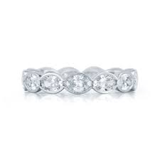 By Kwiat Oval Diamond Eternity Band In A Half Bezel Setting In Platinum Each Di Eternity Band Diamond Eternity Ring Diamond Bespoke Diamond Engagement Ring