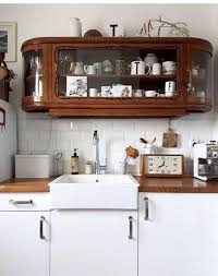 Start with a corner wall cabinet place the corner wall cabinet on the screws or ledger. Antique Wall Mounted Oak Glass Cabinet White Brick Backsplash Kitchen Design Home Kitchens House Interior