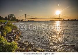 In detroit, illinois, the first day of march is 11 hours, 21 minutes long. View Of Ambassador Bridge Connecting Windsor Ontario To Detroit Michigan At Sunset Time Canstock