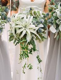 Anastasia used a complimentary assortment of picasso calla. Wedding Flowers Green Wedding Flowers Bouquets