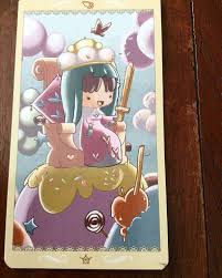 The Queen Of Swords From The Happy Tarot Deck By Serena Ficca Asks That You Steer Your Decision Making Process Independently With Logical Thought And Without Em