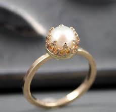 10 Gorgeous Pearl Engagement Rings For Every Kind Of Bride Mywedding Gold Pearl Ring Pearl Engagement Ring Pearl Ring