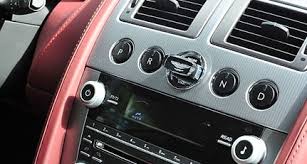 Image result for Amethyst Red 2011 Aston Martin