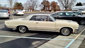 Image result for Singapore Gold 1964 Pontiac