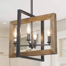 The kitchen has become the hub of many homes, requiring kitchen and dining lighting that can play double duty between illuminating everyday tasks and adding personality to the room's design. Amazon Com Log Barn Dining Room Lighting Fixtures Hanging Farmhouse Chandelier In Distressed Wood And Metal Finish Black Pendant For Kitchen Island Home Kitchen