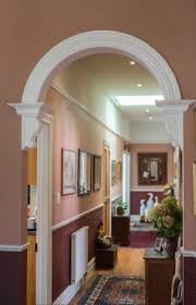 It May Look 100 Years Old But This Christchurch Villa Is A Grand New Lady House Arch Design Classic House Interior Design Archways In Homes