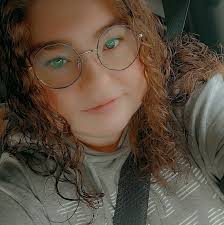 Is aggressive behavior between black moor and orange white fish normal?