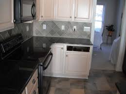 Uba tuba granite countertops with white cabinets. What Color Paint Goes With Uba Tuba Granite