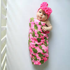 The camo blanket is made of raised plush fabric and silky satin backing and is machine washable. Camouflage Girl Swaddle And Headband Set Baby Blankets