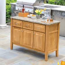 Decorate your modern dining area using a sleek, black buffet with clean lines and metal pulls. Teak Sideboard Buffet Berwick Sideboard W Santa Cecilia Granite Top