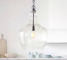 This three light multi light pendant is part of the twister collection and has a polished chrome finish. Flynn Recycled Glass Pendant Pottery Barn