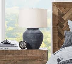 For a den decorated in a traditional style, light the way with the right lamp design. Faris Ceramic Table Lamp Pottery Barn