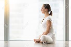 It helps release any toxins and negative. Young Smiling Attractive Woman Practicing Yoga Sitting In Butterfly Exercise Baddha Konasana Pose Working Out Wearing Sportswear White T Shirt Pants Indoor Full Length Profile Copy Space Stock Photo Picture And Royalty Free