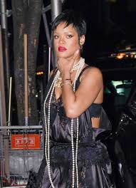 The way y'all skin bout to be litty! Rihanna Wears Black Lingerie And Pearls For Carbone Dinner
