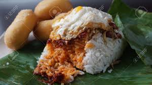 Rasai dan nikmati nasi lemak kami yang pastinya membangkitkan selera anda. Nasi Lemak Telur On Banana Leaves Stock Photo Picture And Royalty Free Image Image 85006795