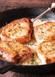 Boneless Pork Chops In Creamy Garlic And Herb Wine Sauce Low Carb Pork Low Carb Pork Chops Pork Recipes