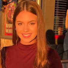 Valedictorian Annelise Mack, a criminal justice major and John Henry  Jackson presidential scholar from Henry County, carried a heavy course load  to finish her degree in three years. “I've tried very hard