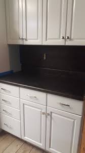 I used the rustoleum cabinet transformation kit in the dark chocolate color on my builder grade oak cabinets. Rustoleum Cabinet Transformation In Frost And Daich Mineral Select Stone Coating Count Rustoleum Cabinet Rustoleum Cabinet Transformation Stone Coat Countertop