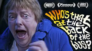 Who's that at the back of the bus?