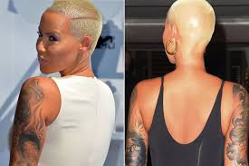 Amber rose tattoos wiz khalifa's face on her arm. Amber Rose Inks Over Tattoo Of Ex Wiz Khalifa People Com