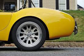 Image result for Canary Yellow 1965 AC Cars