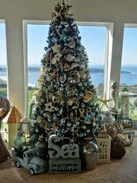 Have your dog on a leash with the family. 740 Beachy Christmas Ideas Beachy Christmas Coastal Christmas Beach Christmas