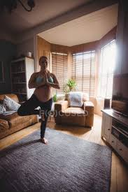 Shop the top 25 most popular 1 at the best prices! Pregnant Woman Performing Yoga In Living Room At Home Maternity Parenthood Stock Photo 228982330