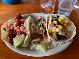 Maybe you would like to learn more about one of these? Baja Fish Taco Fried Fish Cabbage Pico De Gallo Chipotle Crema Corn Tortilla Bangin Shrimp Taco Asian Spicy Fried Cabbage Scallions Chipotle Crema Flour Tortilla Blackened Mahi Taco Cabbage