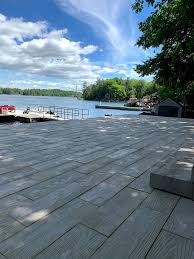 Elevated Stone Deck On A Lake House In 2021 Stone Deck Lake House Deck