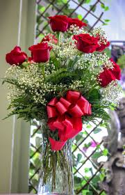 Hours may change under current circumstances 1 Dozen Roses Red Arranged By A Florist In Jacksonville Fl Flower Arrangements Red Flower Arrangements Red Flowers
