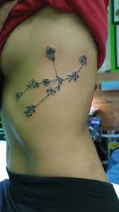 Taurus Constellation Made Of Flowers On Rib Cage Taurus Tattoos Tattoos Taurus Constellation