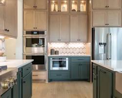 Image of kitchen with painted upper cabinets and stained lower cabinets