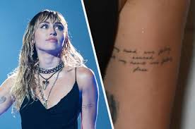 Fyi, the om sign is a popular one for celebs and represents the sound of the universe. Miley Cyrus S New Tattoos Seem To Hint At Her Breakup From Liam Hemsworth And Relationship With Kaitlynn Carter
