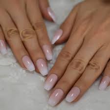 The color combinations and gradient patterns have this pink and purple ombre is another subtle dyeing job that has left us speechless. Pink Ombre Fake Nails Coffin Shape Medium Size Ladies Fingernails Natural French Faux Ongles 24 Ct False Nails Aliexpress