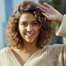 modern hairstyles for thick curly hair