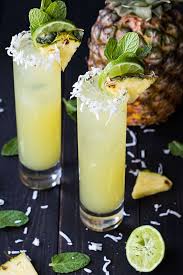 Pineapple Coconut Mojitos The Blond Cook Recipe Pineapple Coconut Coconut Mojito Alcohol Drink Recipes