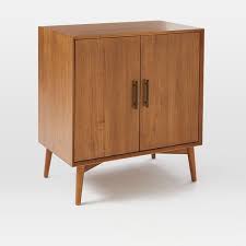 This is an absolutely stunning, warm, and sleek vintage danish modern rosewood and ribbon mahogany credenza or sideboard. Mid Century Bar Cabinet Small