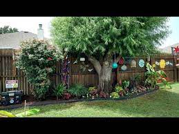 A tropical backyard setting adds personality, charm and a warm, sunny feel to your lawn. Small Backyard Tropical Garden Ideas New Diy Flower Plant Bed Youtube