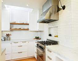 To provide it, just remove the lower shelf, cut a vertical panel of plywood and fasten it at the cabinet bottom with furniture braces and at the top with a strip of wood. Skylight Over Floating Wood Kitchen Shelves Transitional Kitchen