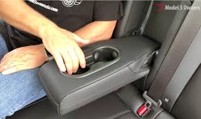 Use the adjustment handles on the outside corner of each outboard we are learning about several interesting new features related to model y's cargo capacity, including these quick release button to fold the back seats Tesla Model 3 Interior Touchscreen Center Console Model 3 Owners Club Deep Dive Part 2